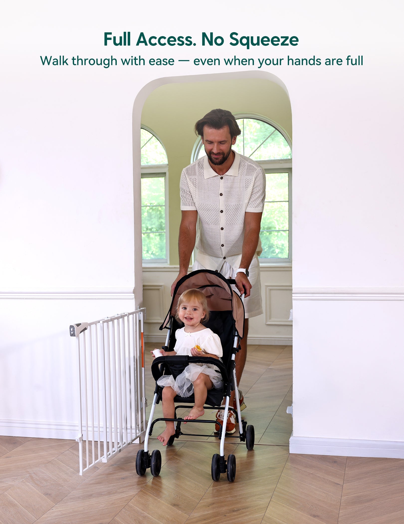 Babelio baby safety gate installed in hallway, adult pushing stroller through open gate