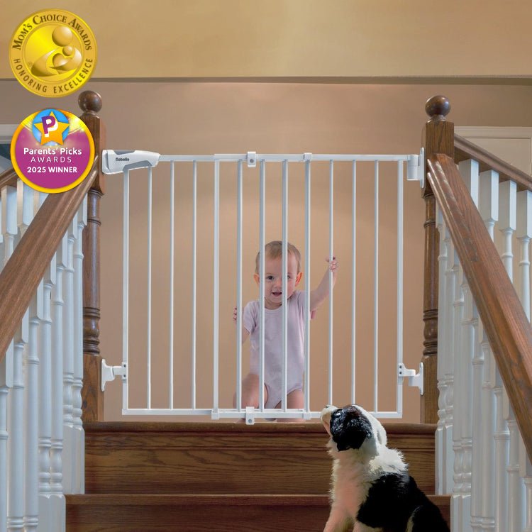 Babelio baby safety gate installed on staircase with baby and dog, award badges visible