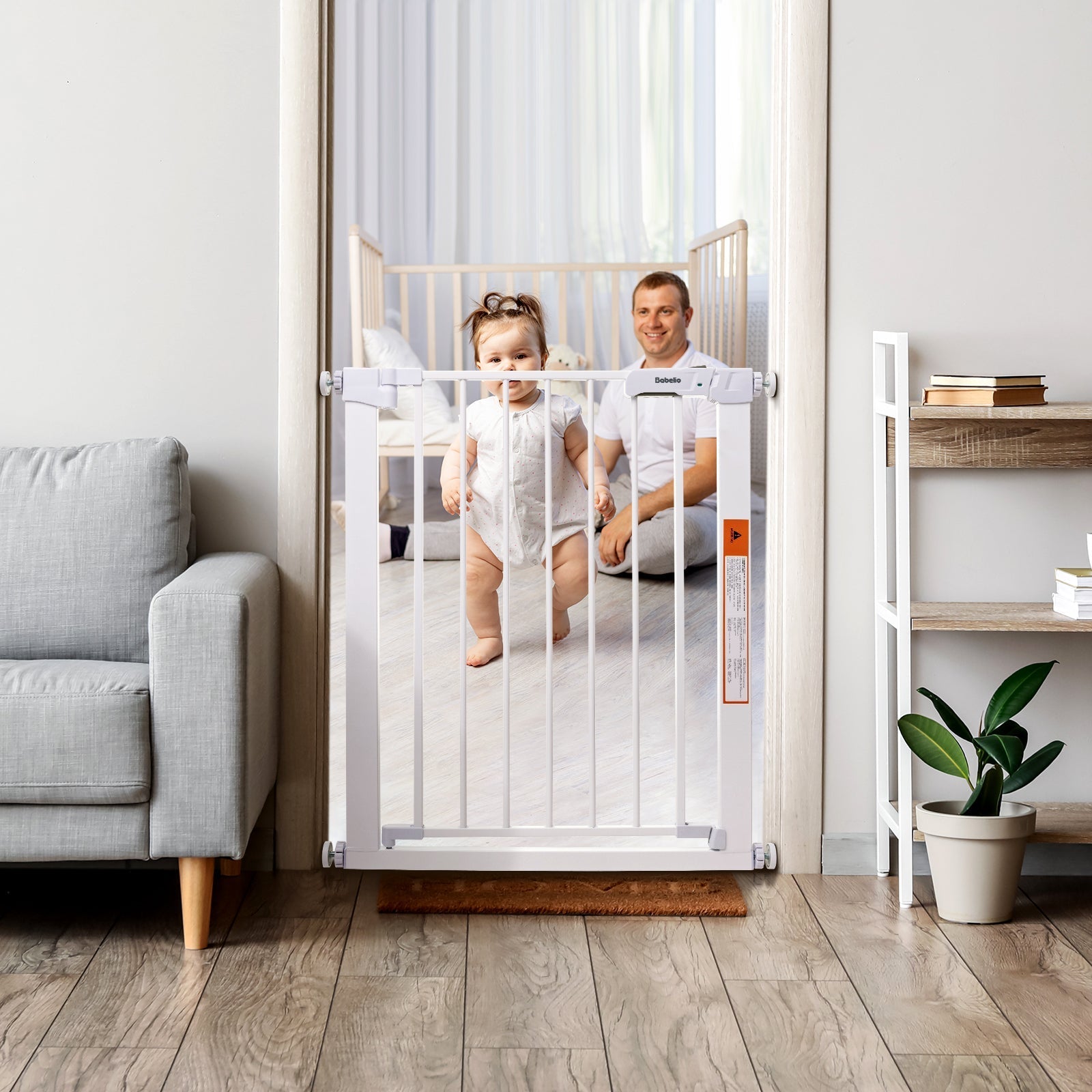 Babelio baby safety gate installed in a modern nursery with baby and parent