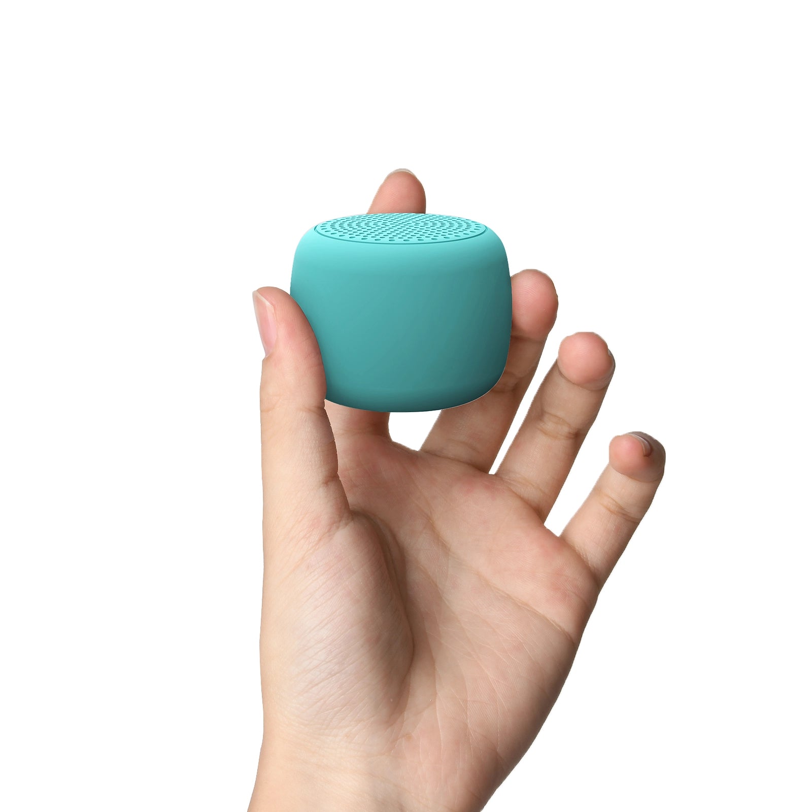 Hand holding Babelio turquoise white noise machine for babies on white background