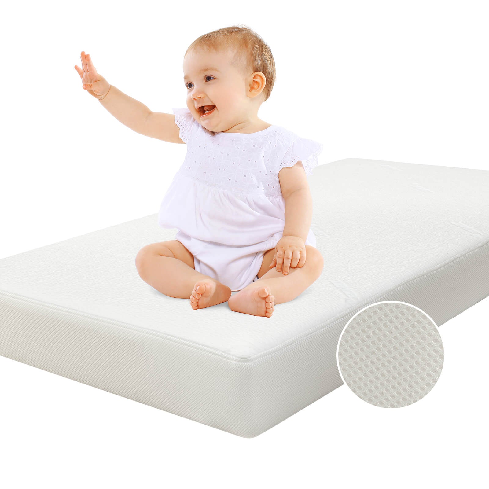 Babelio crib mattress with baby sitting on top, white breathable cover, nursery setting