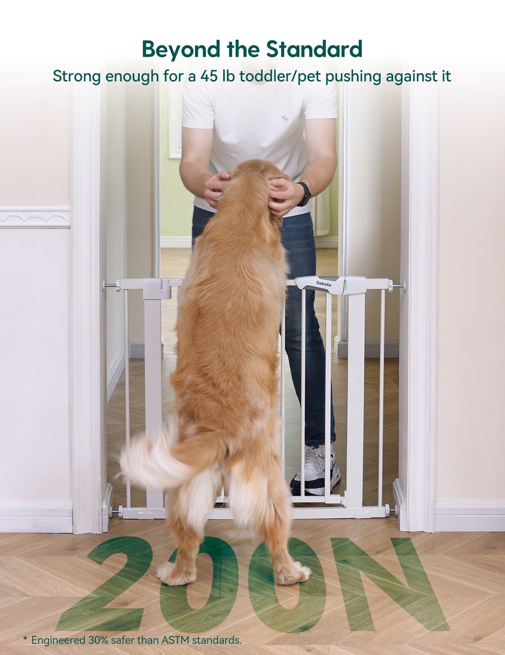 Babelio baby safety gate installed in hallway with dog and adult demonstrating strength#Color_White