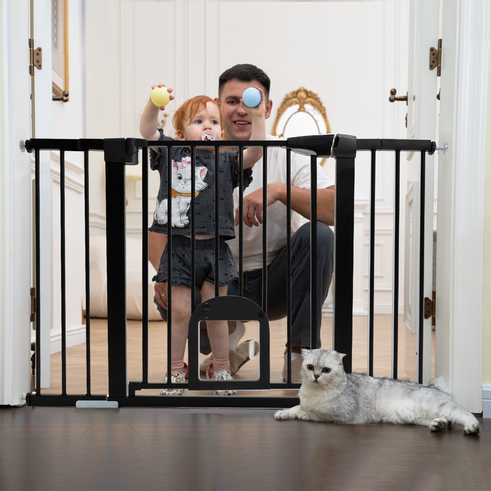 Babelio baby safety gate installed in a doorway with a child, adult, and cat in a living room